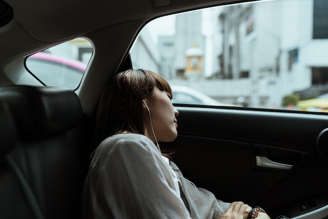 person sleep in car