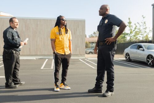 man speaking to parole officers