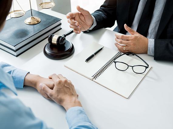 lawyer and client discussing a case